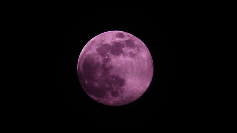 Pink super moon rises above London