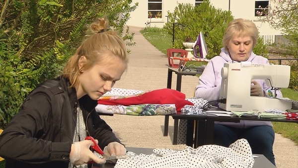 Olga and Sophie are among 15 other women making 6,000 masks for those living in direct provision