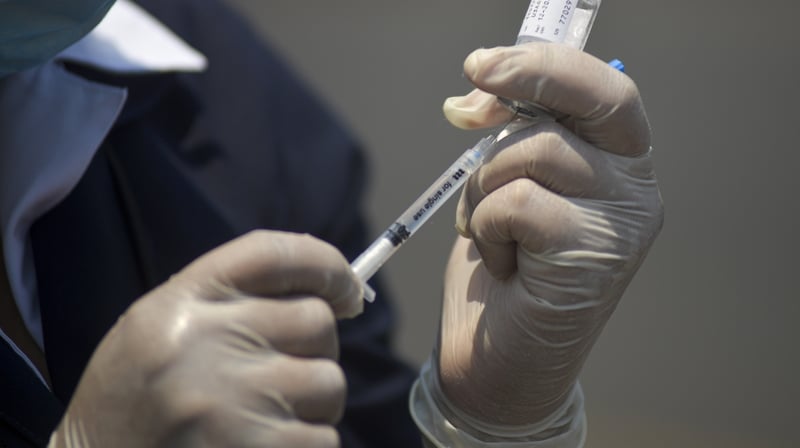 Most industry experts say that a vaccine could take as long as 18 months to be developed and distributed