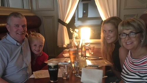 Donal Bradley (L) pictured with his grandson Tiernan, daughter Amy and wife Denise