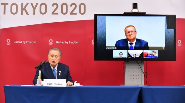 Tokyo 2020 President Yoshiro Mori (L) and John Coates (top on screen)