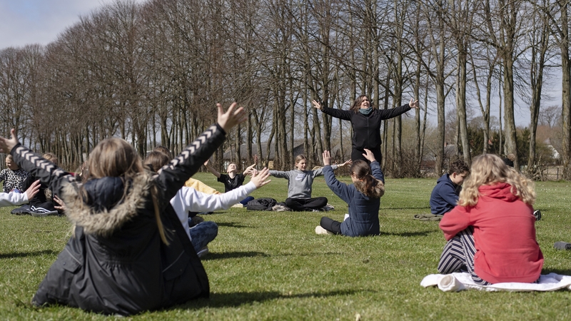 Teacher Rebekka Hjorth holds an outdoor lesson with her class in Randers, Denmark. Photo: Bo Amstrup/EPA -EFE