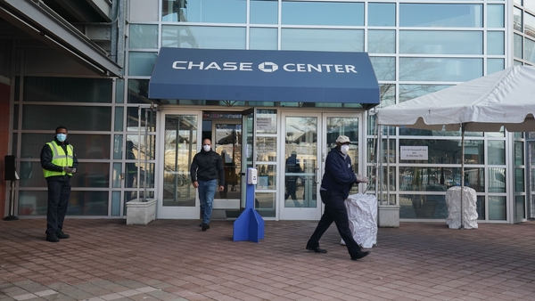 Worker leave a temporary field hospital at the USTA Billie Jean King National Tennis Center