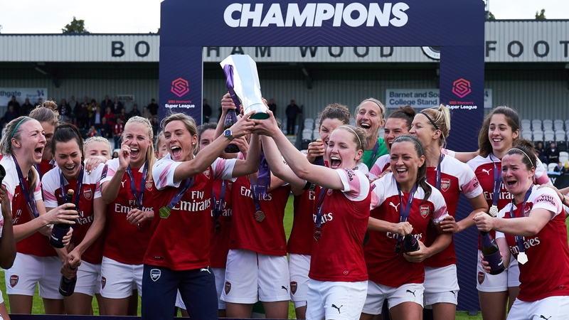 Arsenal's Kim Little (holding trophy on right) won the Super League alongside Irish pair Louise Quinn and Katie McCabe last season