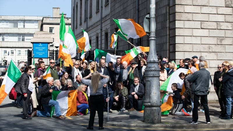 "According to the Health Act 1947, this gathering in support of John Waters and Gemma O'Doherty outside the Four Courts in Dublin was a punishable offence" Photo: Tom Honan for The Irish Times.