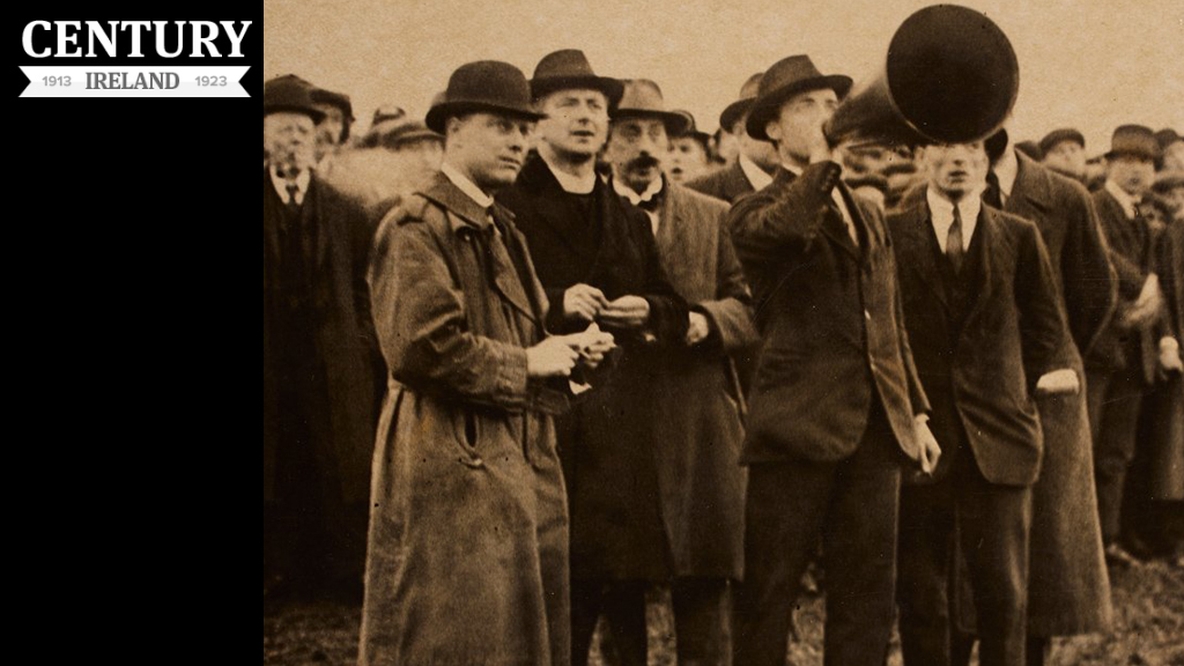 Image of crowd listening to a man speaking to hunger strikers via a megaphone at Wormwood Scrubs
Photo: National Library of Ireland, NPA SF