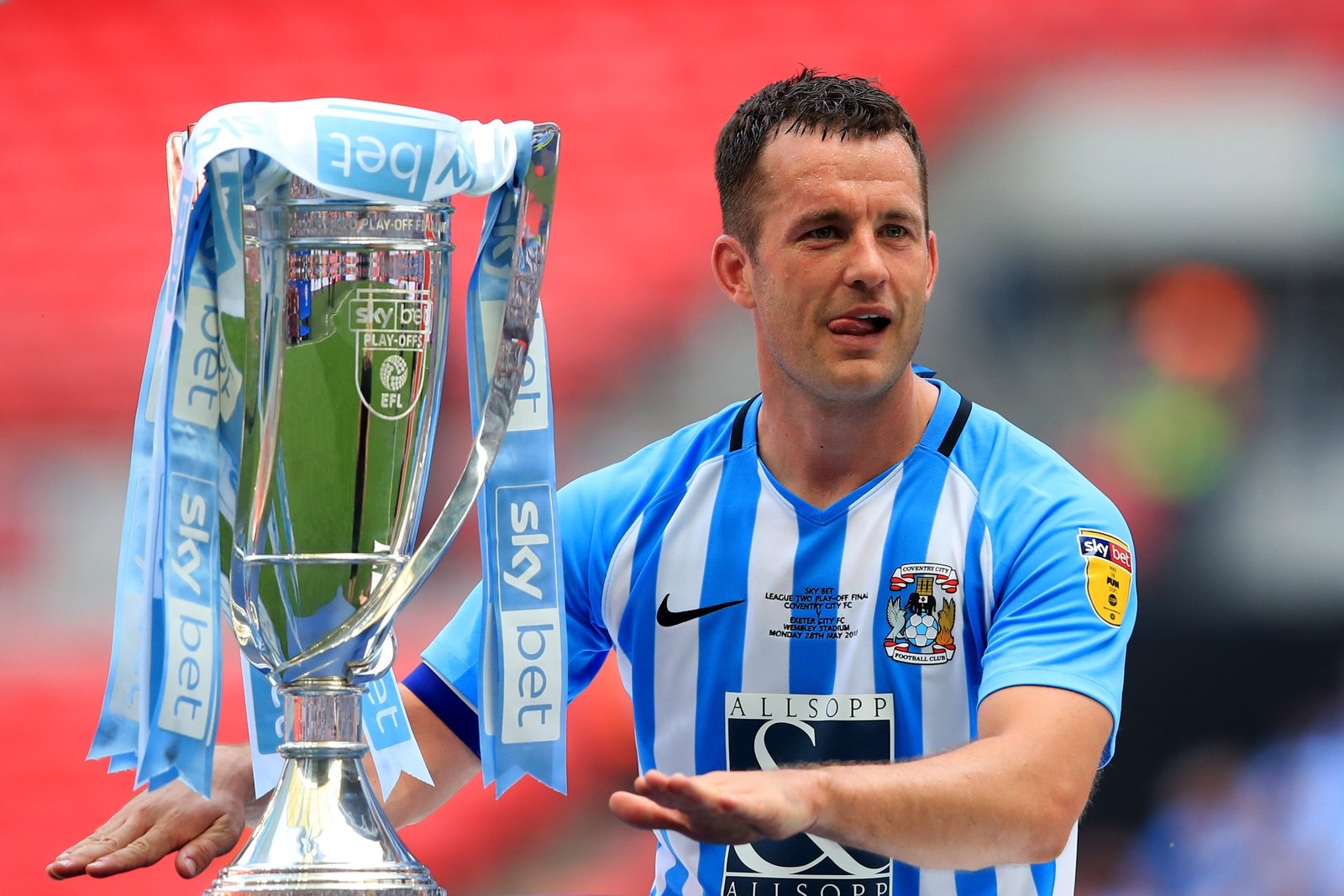 Doyle with the League Two Play Off Final trophy in May 2018