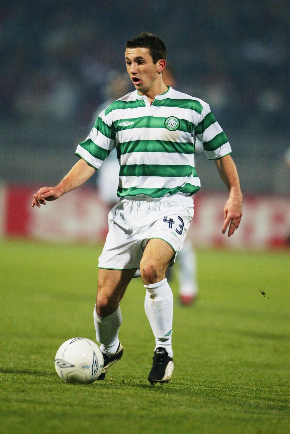 Liam Miller facing Lyon in the Champions League in 2003