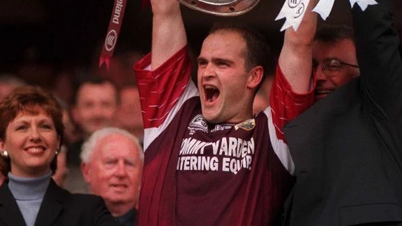 Ray Silke holds Sam aloft