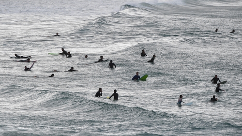 There were large numbers in the sea, and the sand remained largely empty