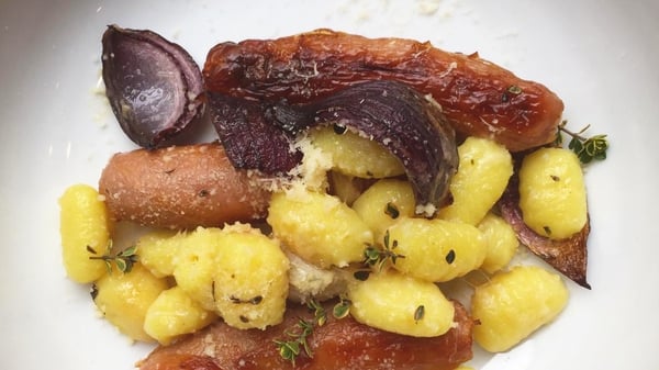 Baked Sausages with Gnocchi & Red Onion