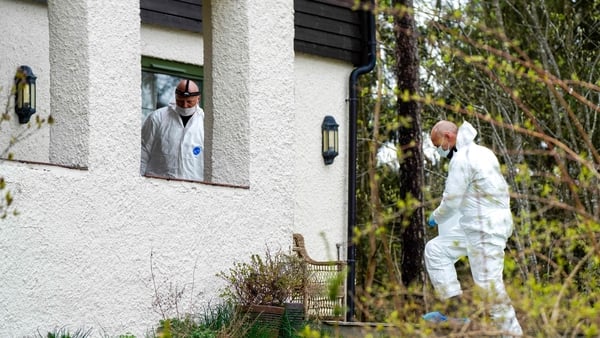 Policemen search the Hagen residence in Lorenskog near Oslo,