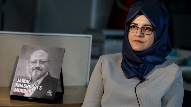 Hatice Cengiz pictured with a portrait of her late fiancée, murdered Saudi Arabian journalist Jamal Khashoggi