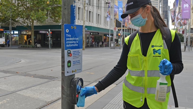 Traffic lights cleaned in Melbourne as part of moves against Covid-19