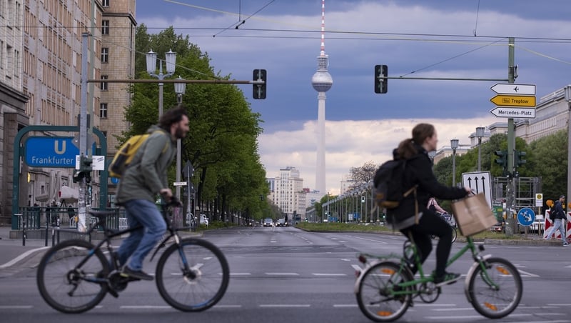 Germany is inching out of a nationwide lockdown imposed to slow the virus' spread, with shops, restaurants and factories gradually reopening