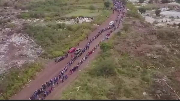 Thousands of people queued for the food parcels