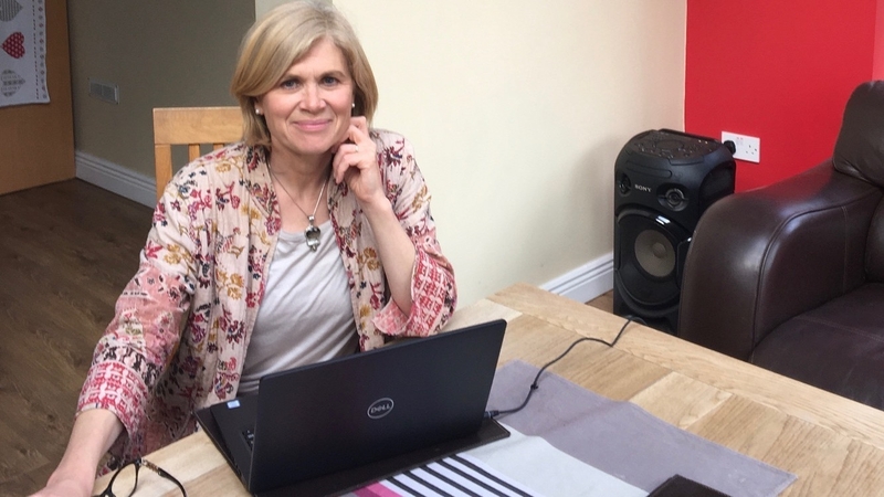 Table for one: Anne Cassin is able to do some of her work at the kitchen table