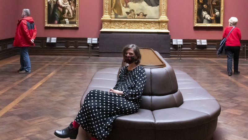 Visitors at the reopened Old Masters Gallery at the Zwinger palace complex in Dresden, Germany, today