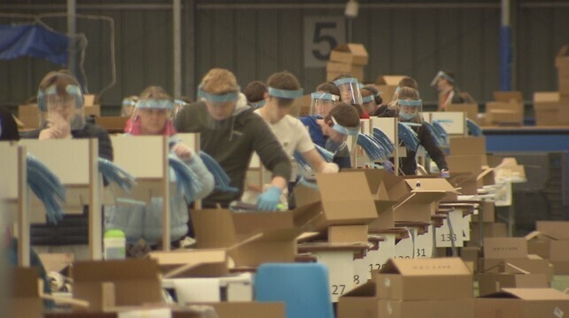 Workers at the Meadowbank Sports Arena are making up to two million face masks a week