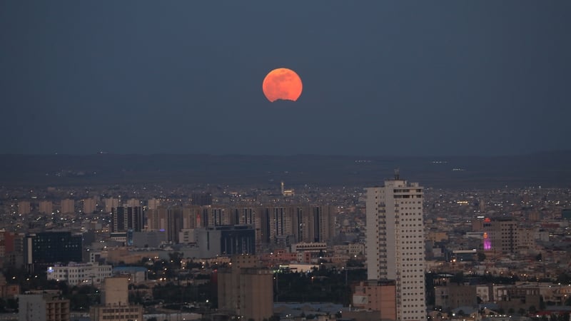 The supermoon rises over Erbil, Iraq