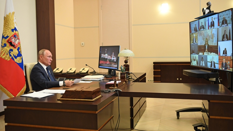 Vladimir Putin chairs a remote meeting of Russian government officials