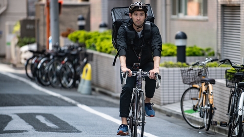 Ryo Miyake delivering food in Tokyo