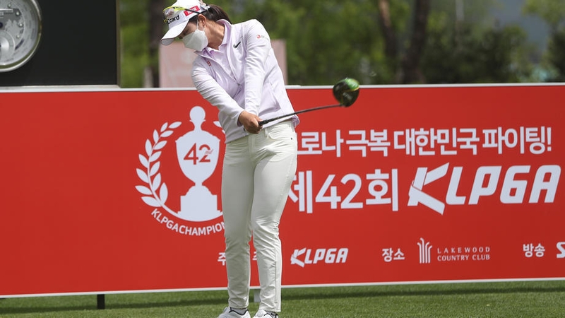 Han Jin-seon of South Korea practises while wearing a mask