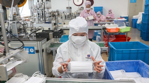 Chinese factory output grew 9.8% in April from a year ago, slower than the 14.1% surge in March
