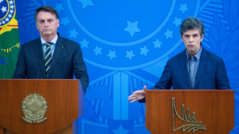 Nelson Teich (R) pictured with Jair Bolsonaro after Mr Teich was appointed Brazil's health minister last month