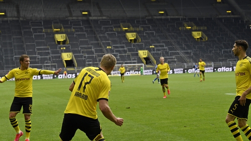 Erling Braut Haaland scored the opening goal for Dortmund against Schalke at an empty Signal Iduna Park