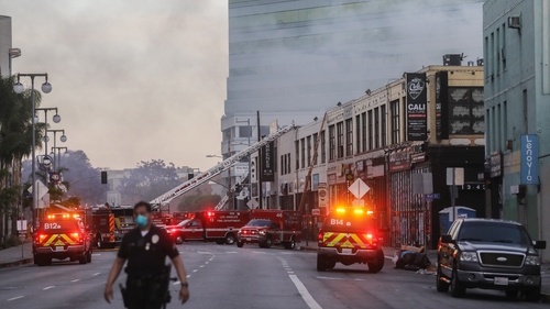 230 emergency responders battled the blaze as it spread to other buildings in the area