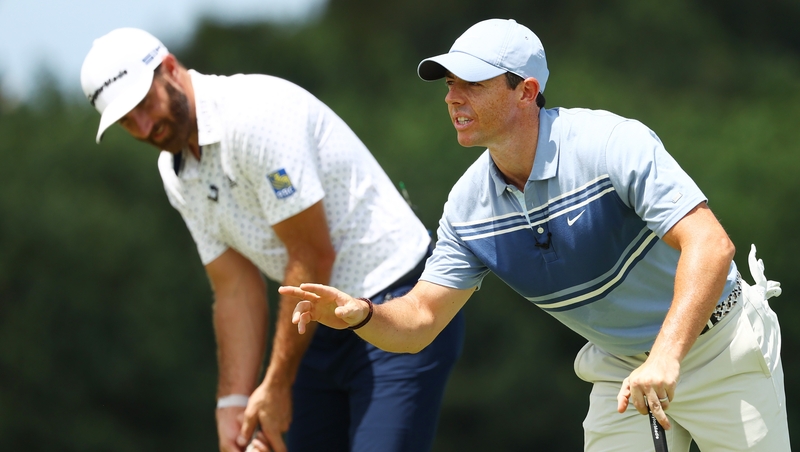 Dustin Johnson and Rory McIlroy (r)