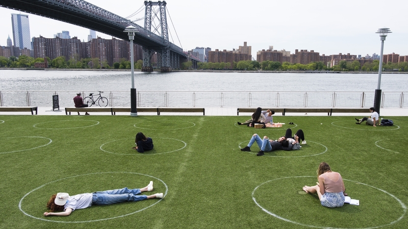 The circles, painted on the grass, allow picnickers and sunbathers stay a safe distance from each other