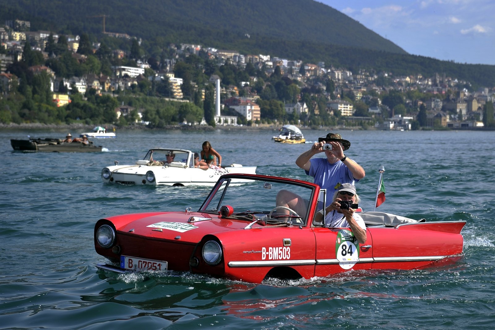 Amphibious cars motor across Lake Neuchatel in 2011