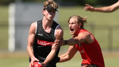 Anton Tohill (left) of Collingwood Magpies will be back in Australia on Saturday