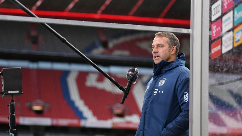 Hans-Dieter Flick gives an interview before his side's win over Frankfurt
