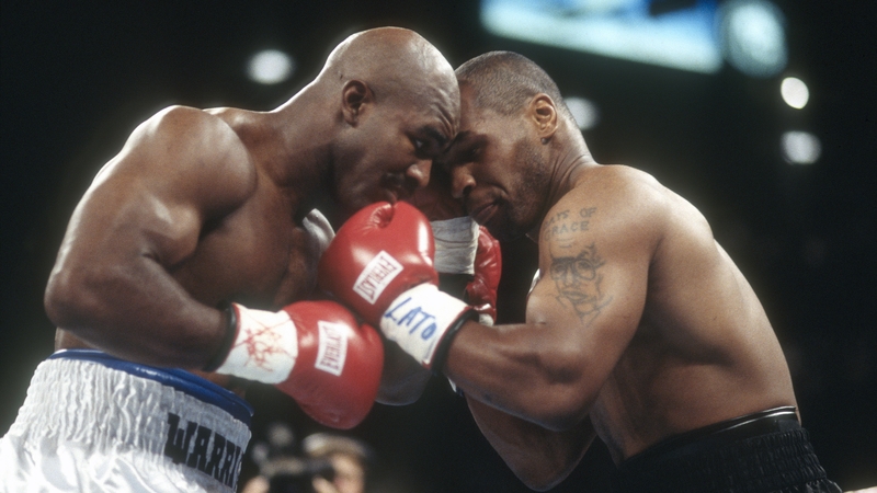 Evander Holyfield and Mike Tyson during their bout in 1997
