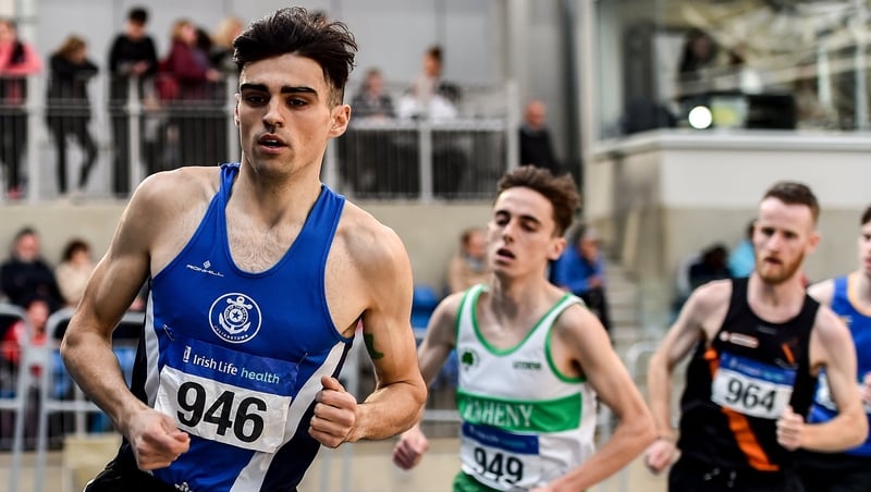 Coscoran on his way to victory in the men's national indoor 1500 metres