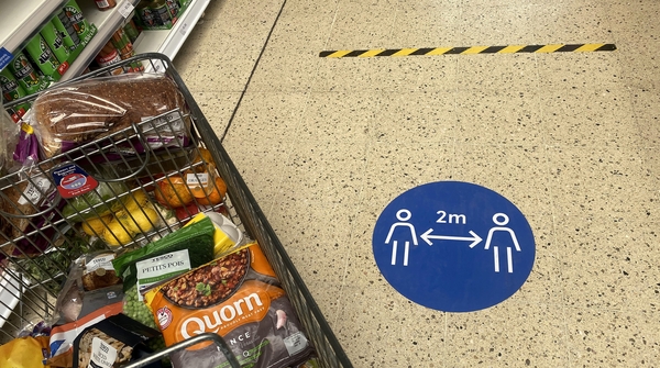 Tesco said a jump in sales due to the Covid-19 pandemic was more than outweighed by higher costs and losses at Tesco Bank