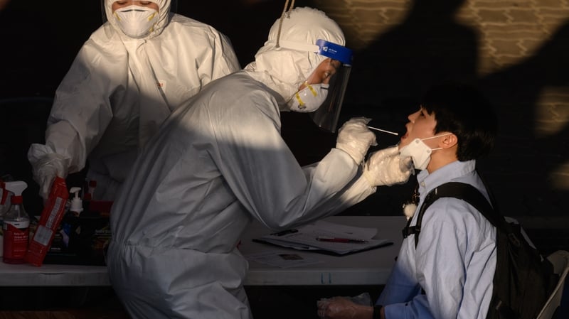 A health worker administers a swab at a temporary testing centre in Bucheon, where there has been an outbreak
