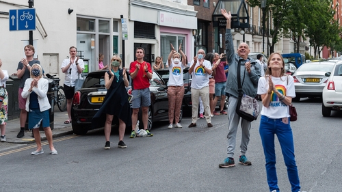 Local residents clap their hands outside Chelsea and Westminster Hospital in London during last Thursday's event