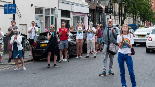 Local residents clap their hands outside Chelsea and Westminster Hospital in London during last Thursday's event