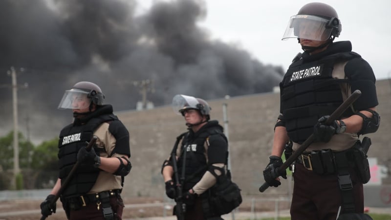Police on the streets of Minneapolis which has been gripped by days of violent protests