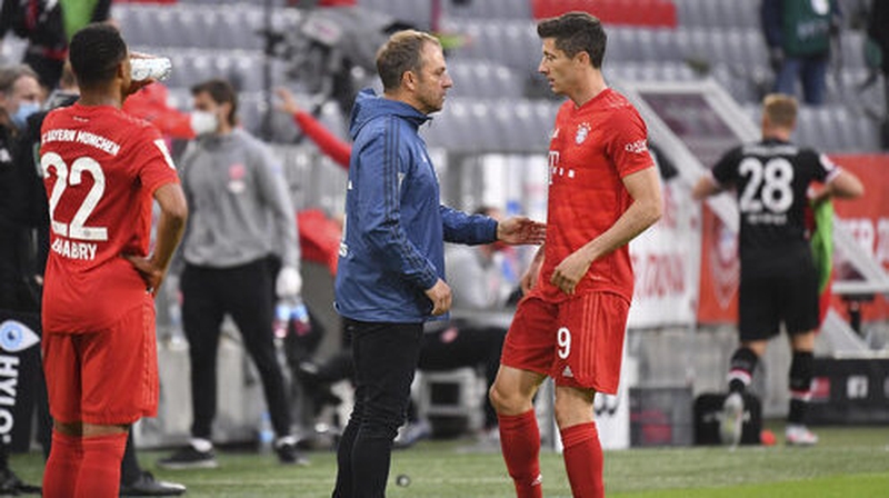 Hans-Dieter Flick with Robert Lewandowsk who bagged a brace