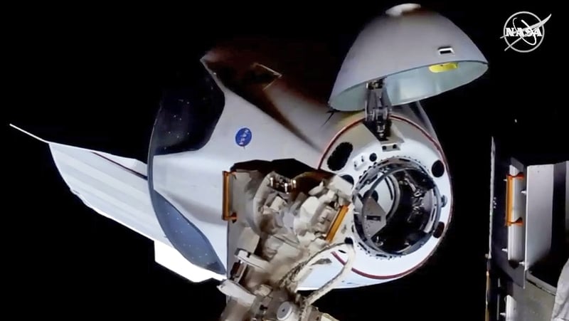 A handout still image made available by NASA shows SpaceX's Crew Dragon spacecraft approaching to dock with the International Space Station