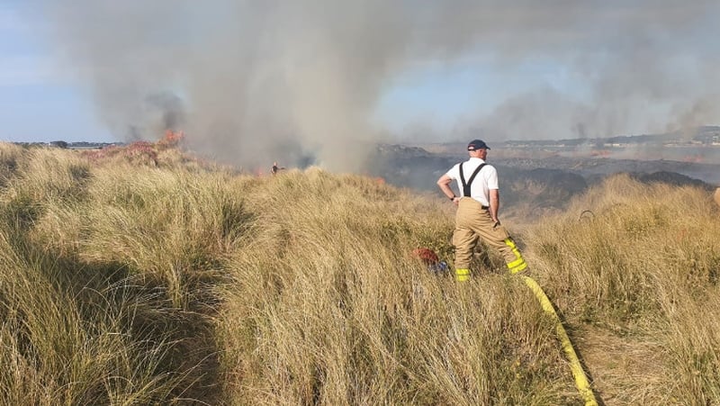 A picture from the Dublin Fire Brigade twitter account showing a crew member in action in Dollymount, Dublin