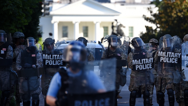Military Police members guard the perimeter near the White House