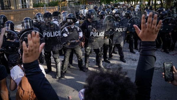 Protesters were cleared from the streets to allow Donald Trump walk to a nearby church