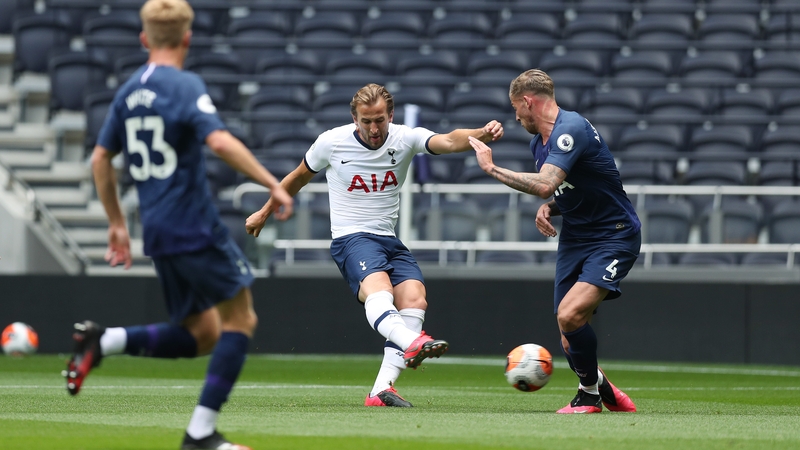 Kane (c) gets a shot off during a training game at Tottenham Hotspur Stadium