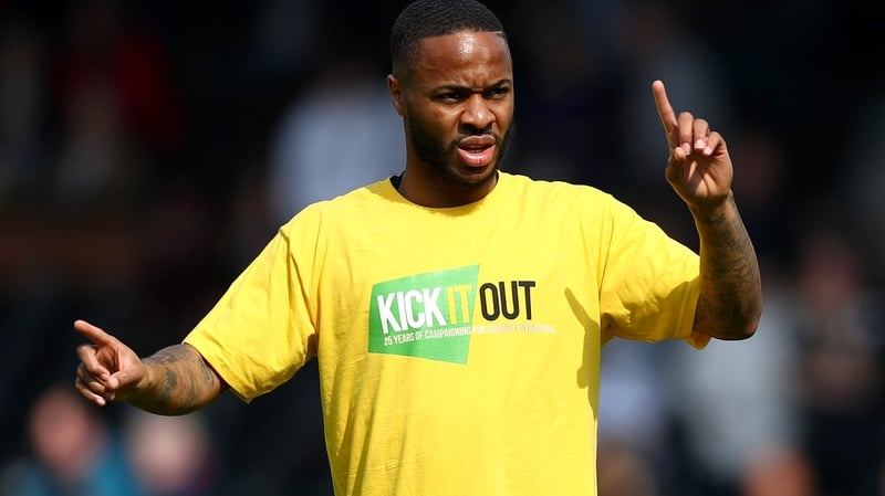 Raheem Sterling wearing a Kick It Out anti-racism shirt in 2019